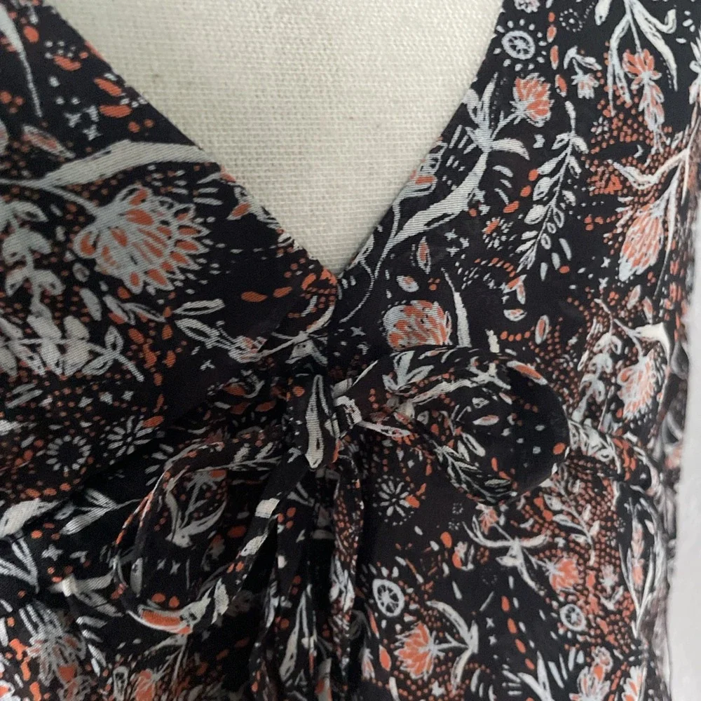 Free People NWOT Uptown Bell Sleeve Tiered Vneck Sheer Black Floral Blouse  S